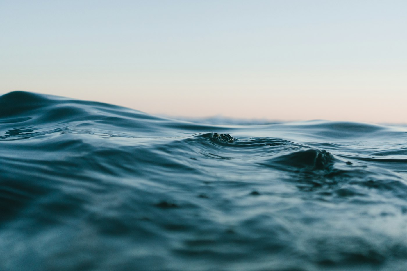 Small ripples across a calm water surface